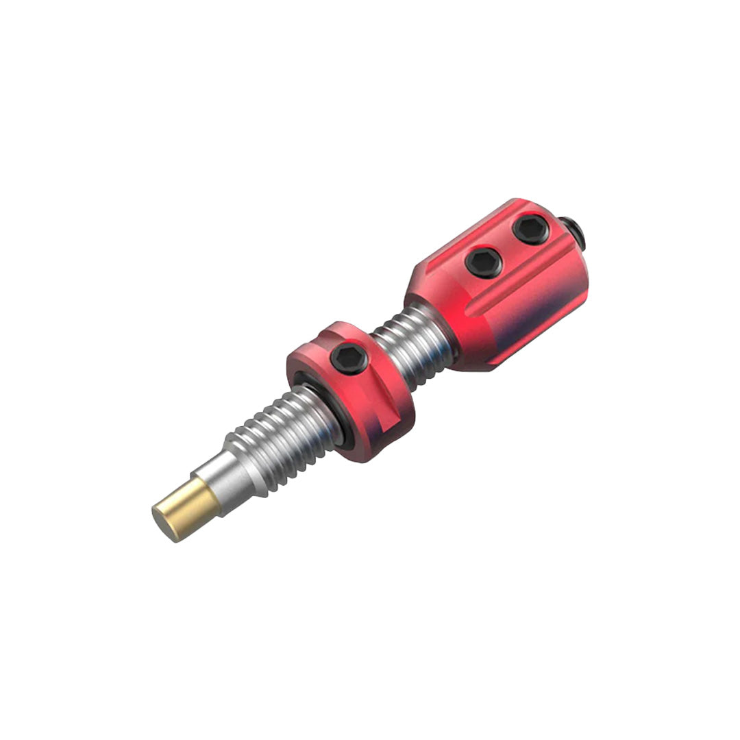 Photo of red Bicaster plunger button on a white background.