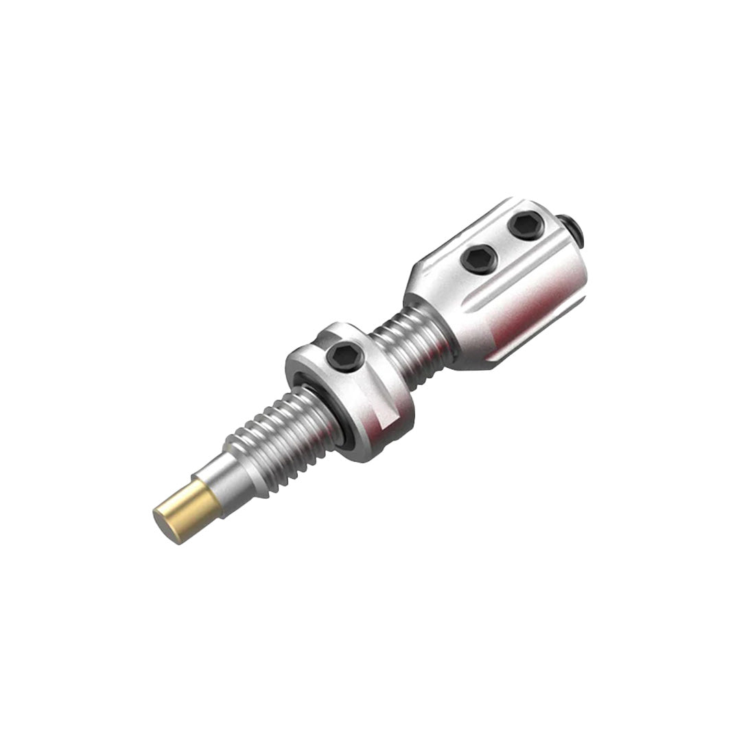 Photo of silver Bicaster plunger button on a white background.