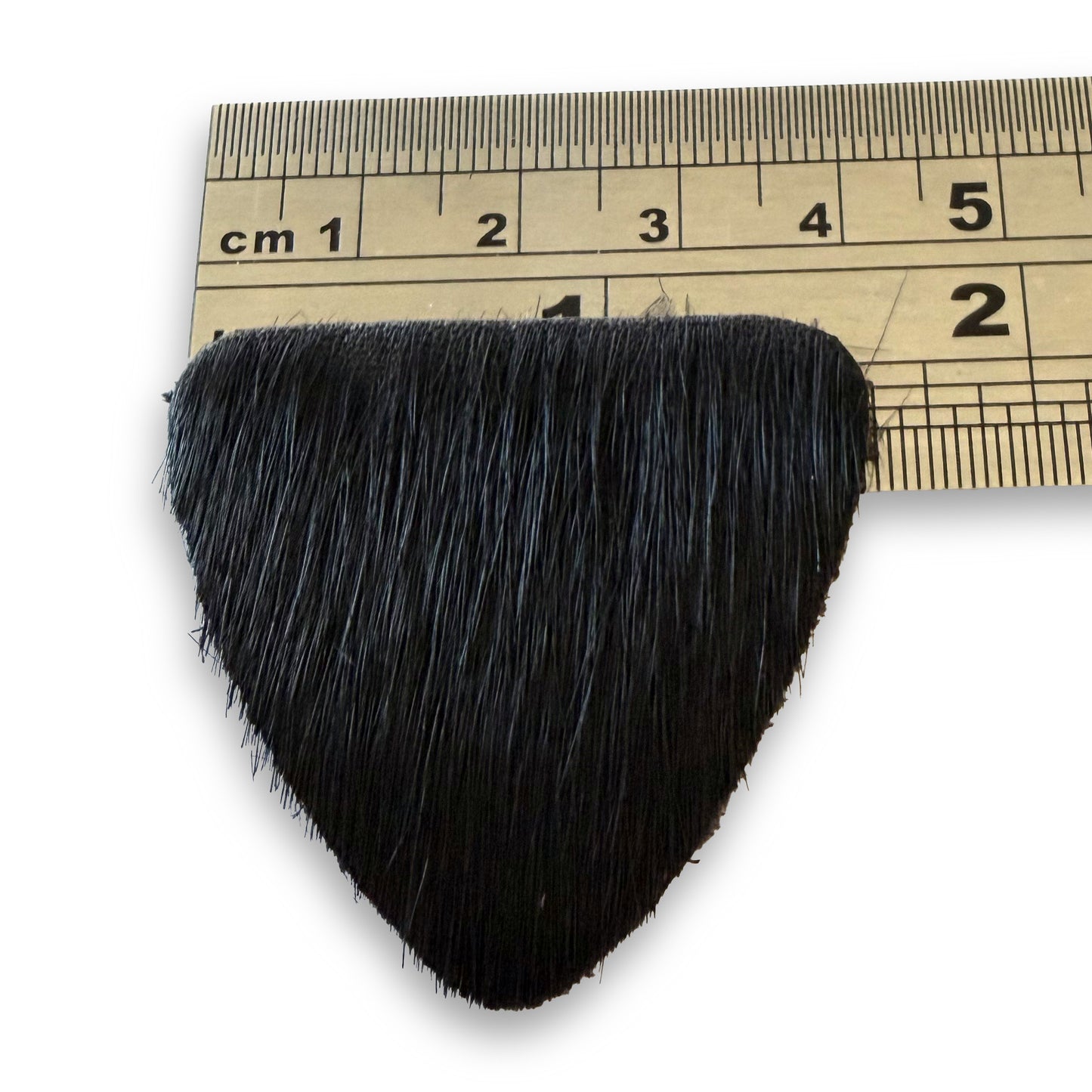 Buck Trail calf hair shelf and plate rug rest